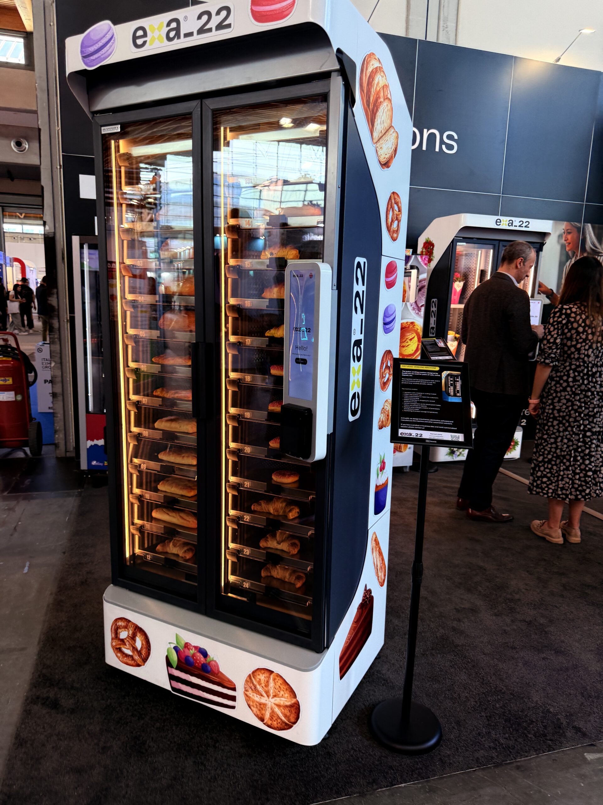 Bakery vending machine with lit glass front displaying bread and pastries