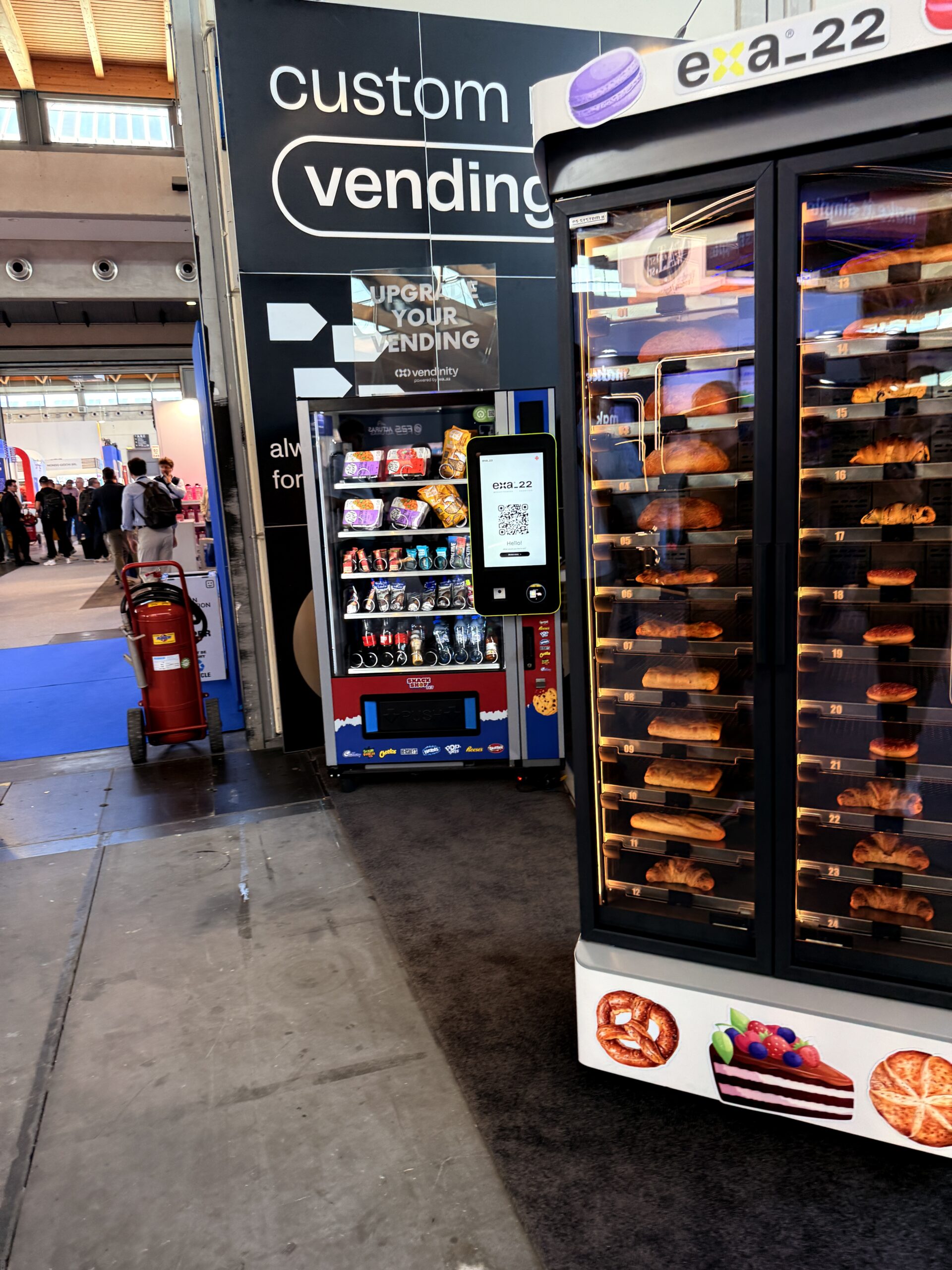 Branded bakery vending machine cabinet with bread and pastry graphics on the exterior panels