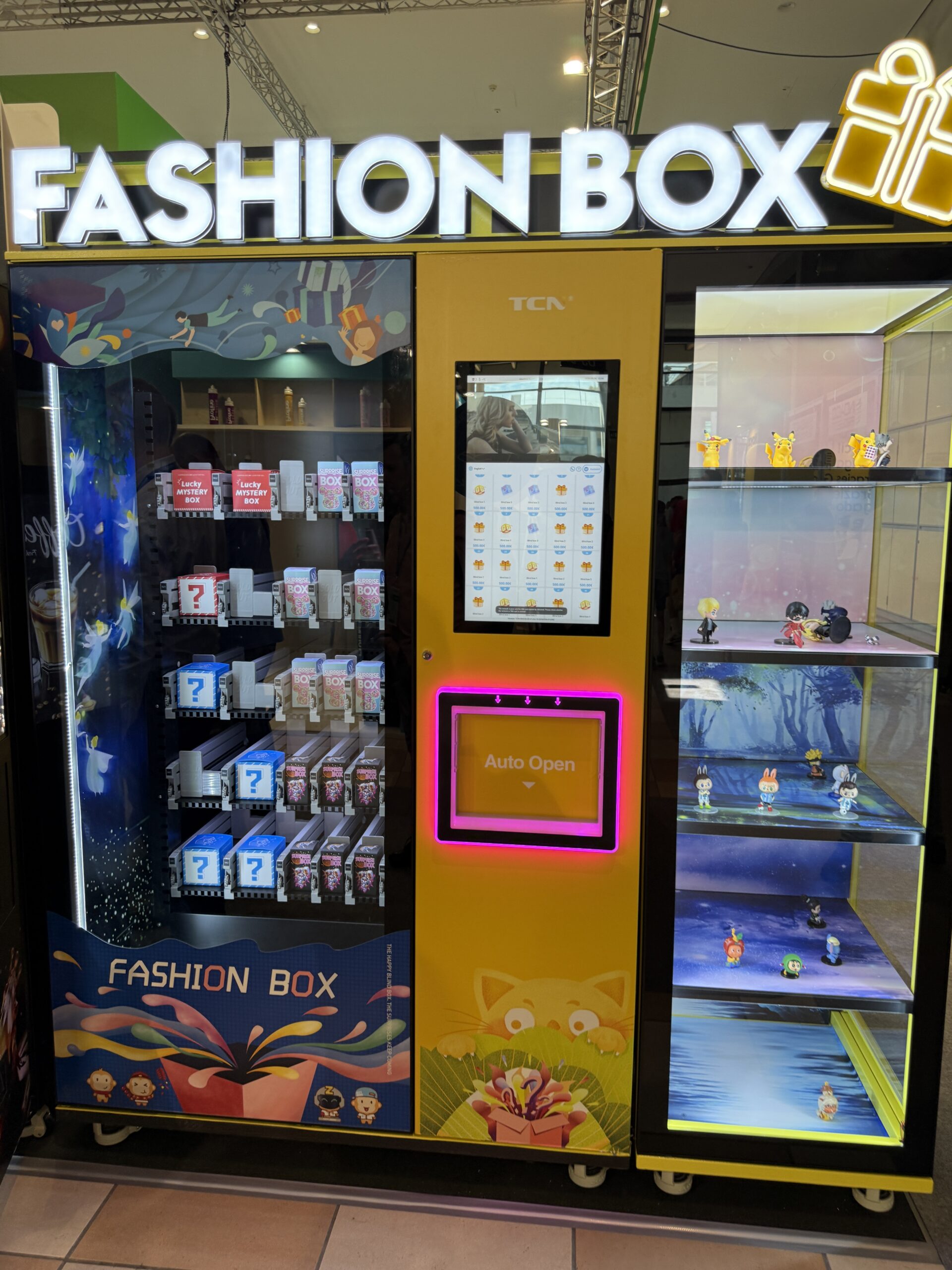 Vending cabinet loaded with sealed mystery boxes and blind box collectibles