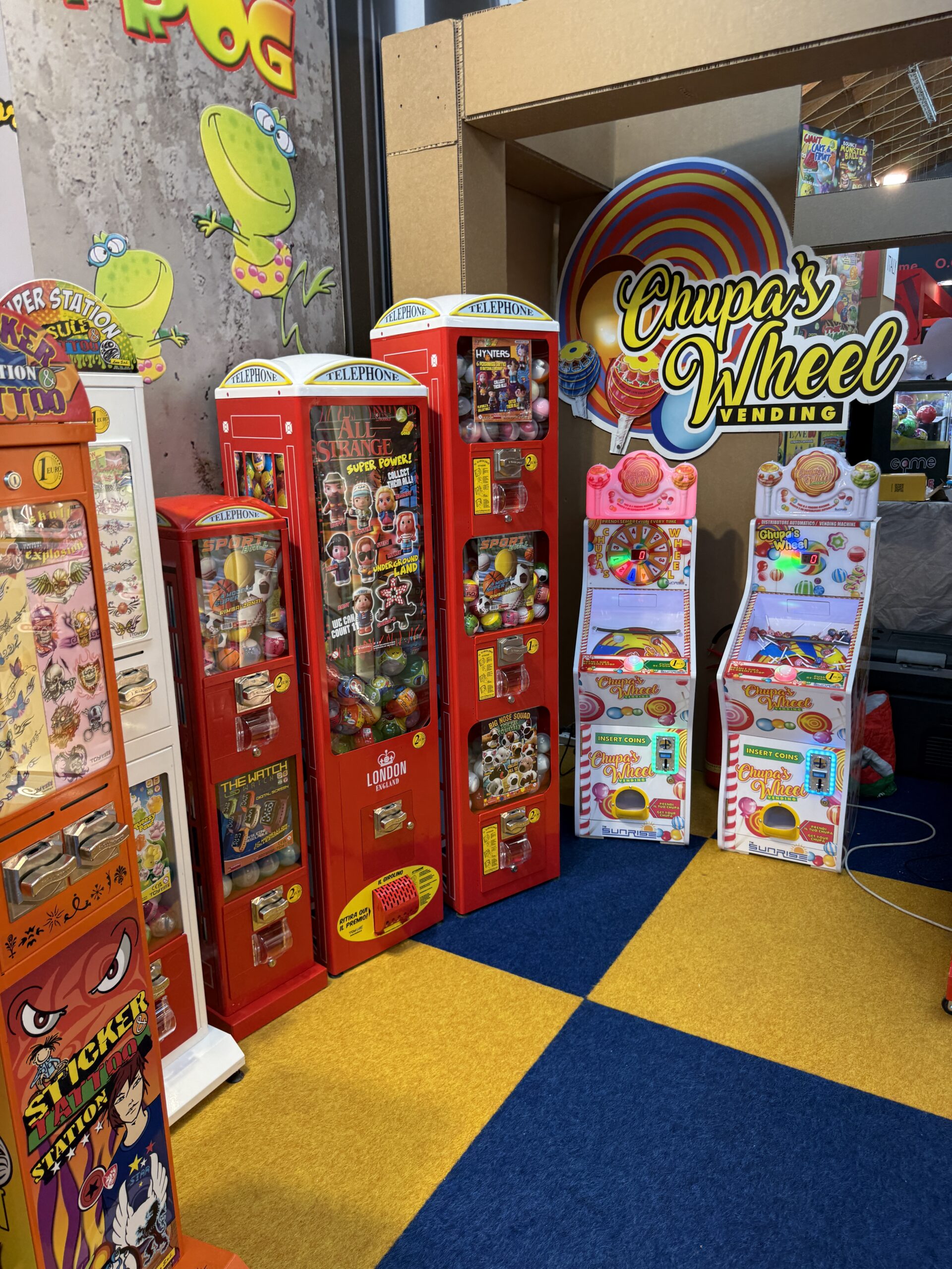 Mystery ball vending machine with colour changing lighting in a venue